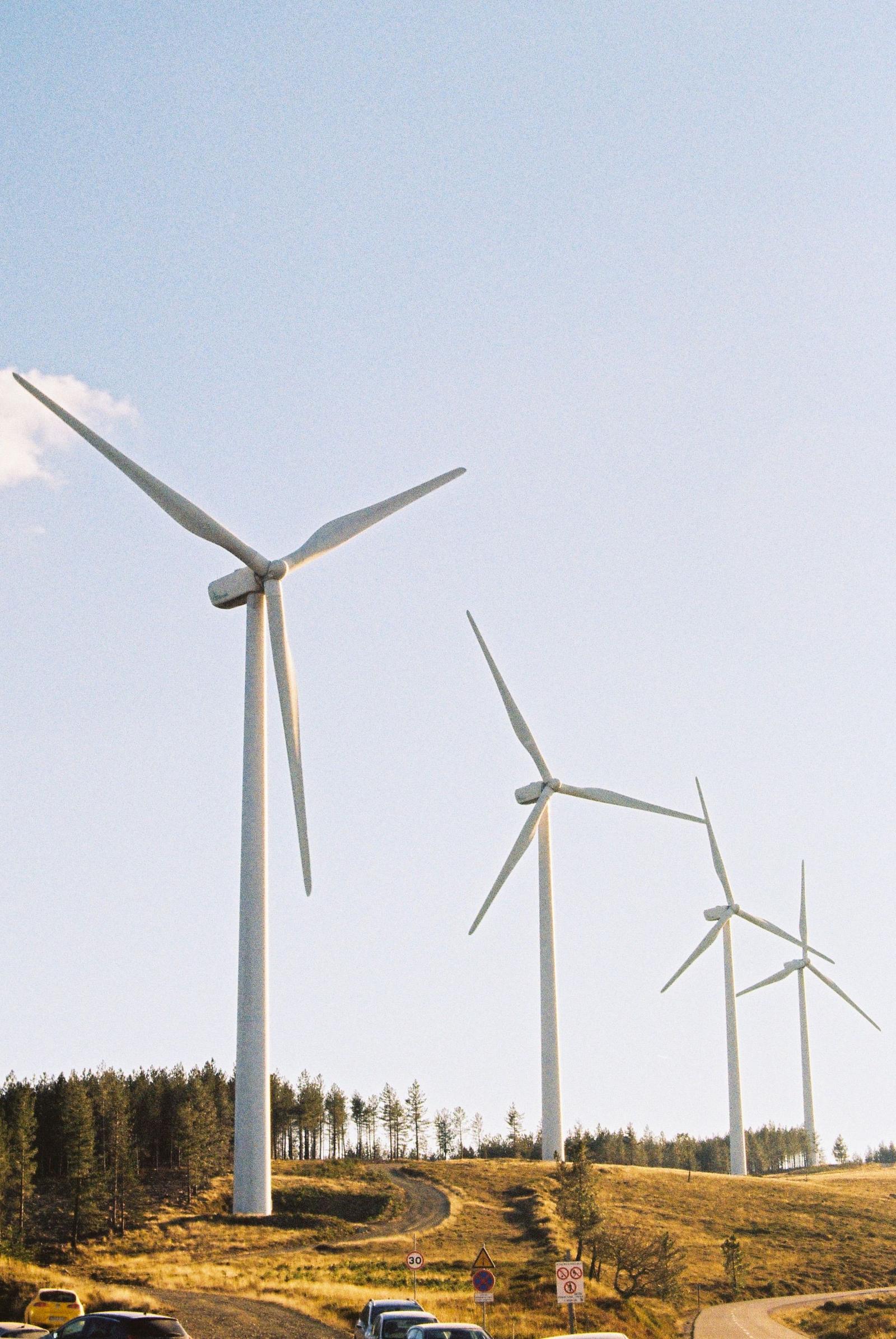 Wind turbines against a clear sky